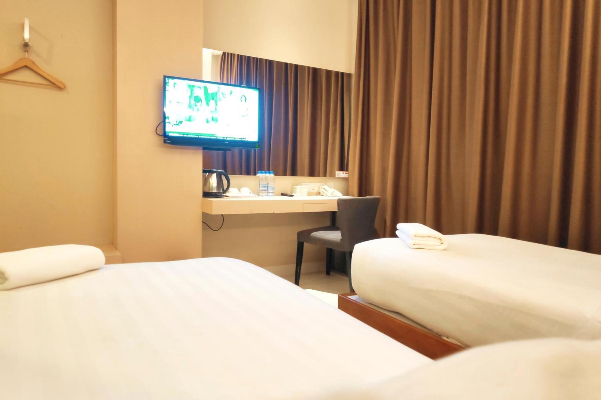 Os Hotel Airport Batam Екстериор снимка